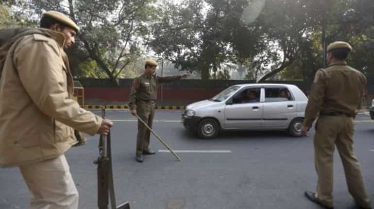 Delhi cop runs over bureaucrat's mother