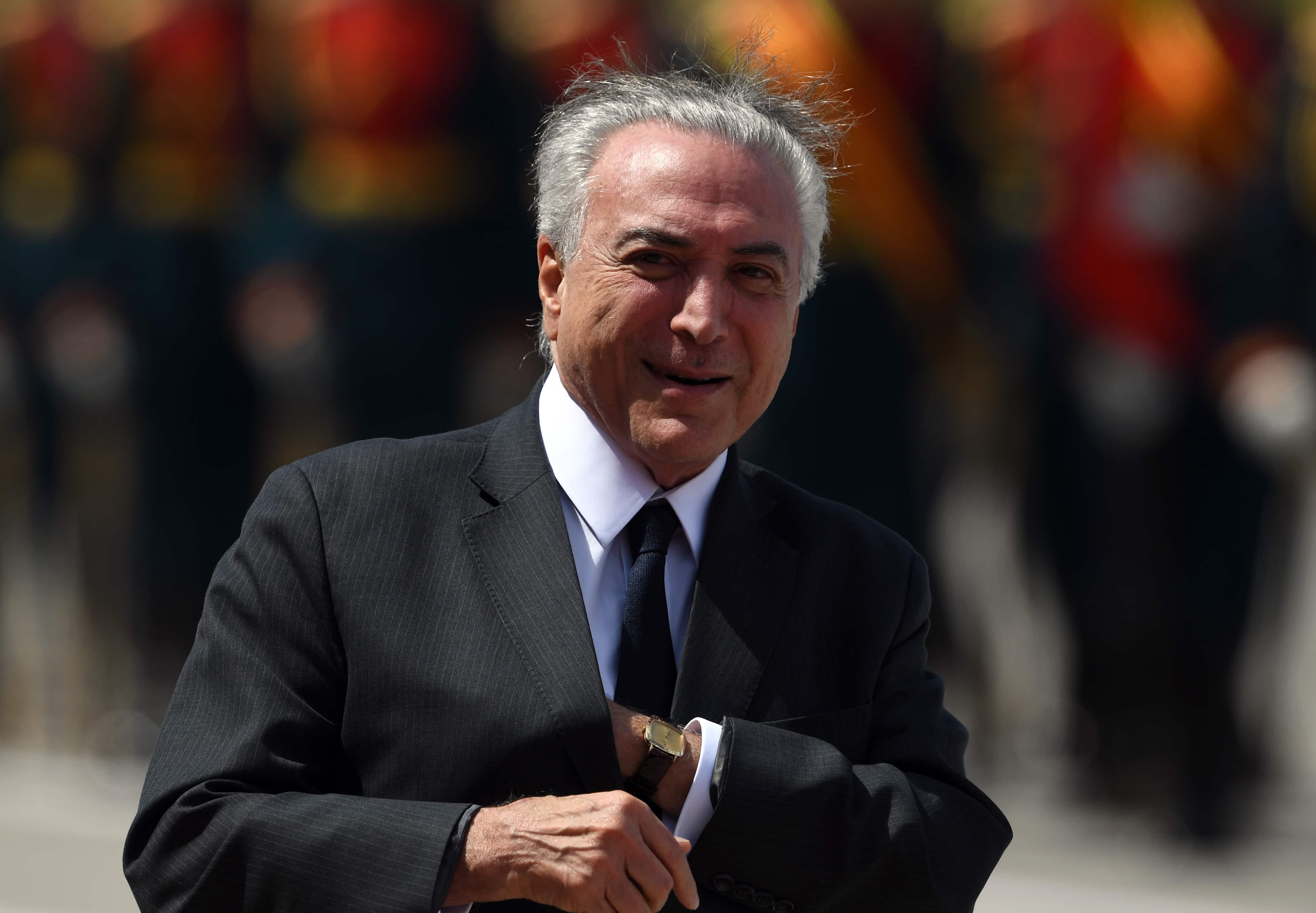Brazil president Michel Temer accepted bribes, say police