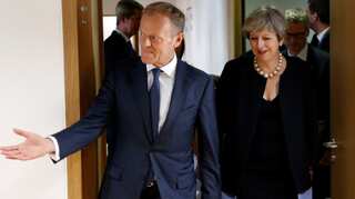 Theresa May offers 'fair deal' to EU citizens living in Britain