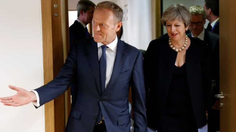 Theresa May offers 'fair deal' to EU citizens living in Britain