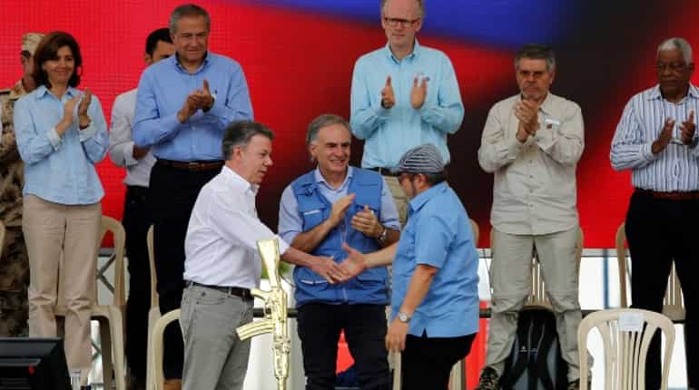 FARC rebels turn in weapons to UN, end 50-year war with Colombia