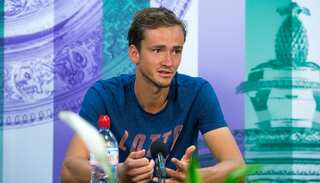 Wimbledon: Medvedev sorry for throwing coins at umpire