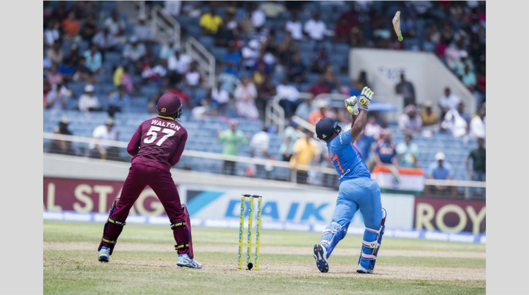Karthik keeps West Indies at bay