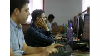 Sensex ends flat, Kotak Mahindra gains
