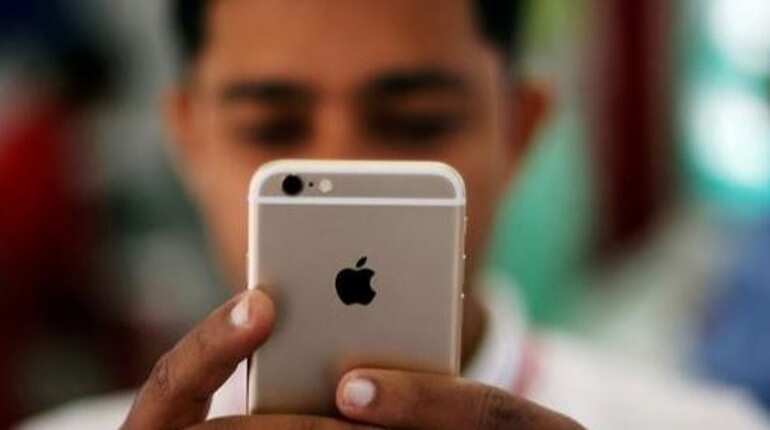 Apple stocks on record high over iPhone sales