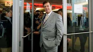 FBI raid on ex-Trump aide's home points towards intensifying Russia probe