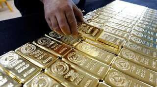 Gold prices inch higher as dollar softens