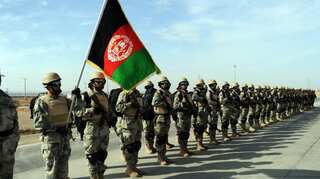 Afghanistan police discover mass graves of recent militant attack
