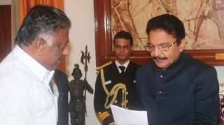 AIADMK rival factions unite, Panneerselvam takes oath as deputy chief minister