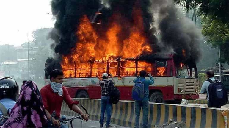 BSP leader shot dead outside Allahabad University hostel, supporters torch bus BSP leader shot dead outside Allahabad University hostel, supporters torch bus