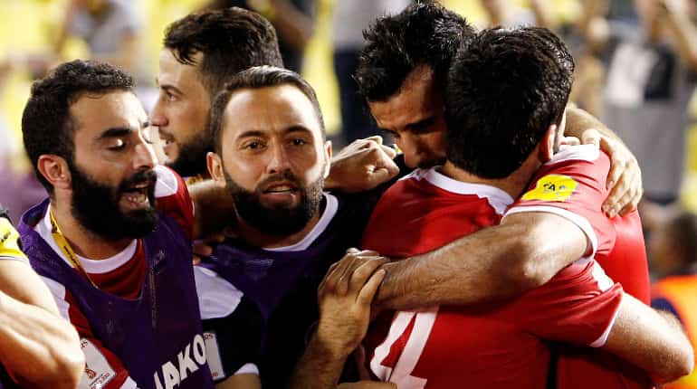 Late penalty keeps Syria's World Cup dream alive