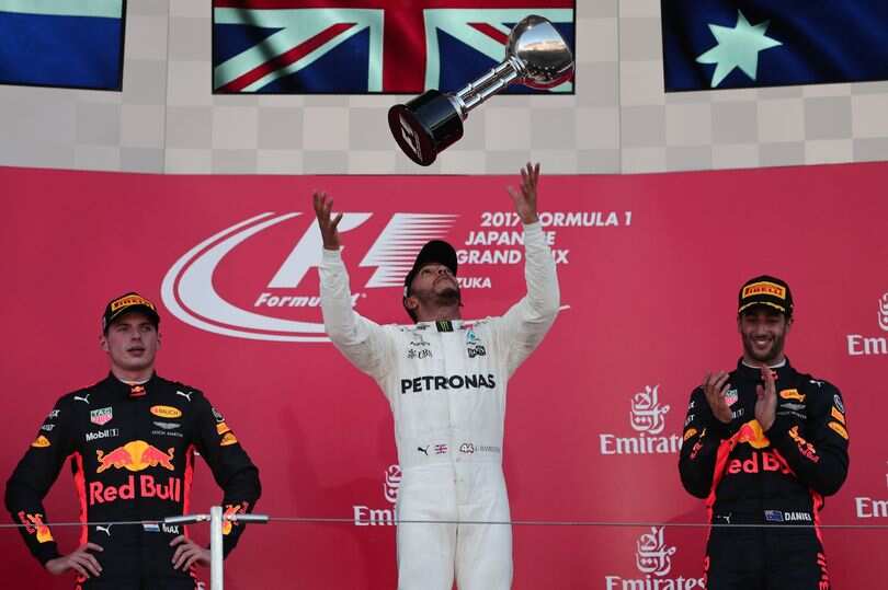 Formula One: Ruthless Hamilton roars to Japan victory Formula One: Ruthless Hamilton roars to Japan victory