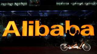 Alibaba Singles' Day tops $30 billion but growth rate plunges