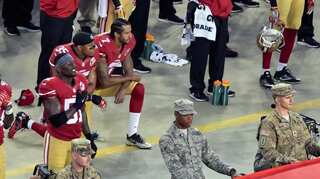 Athlete who started kneeling protest against Trump sues NFL