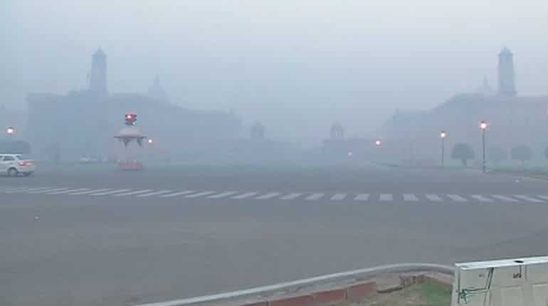A boulevard full of smog