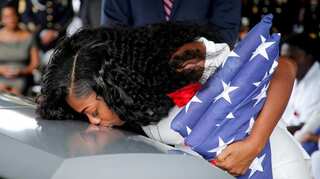 Widow of slain US soldier says Trump call 'made me cry even worse'