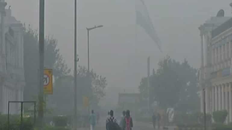 Delhi smog: Schools reopen, several trains delayed