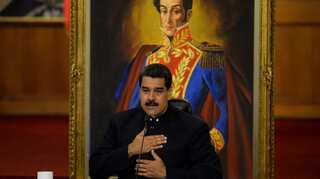 Venezuela signs debt restructuring deal with Russia, gets China backing