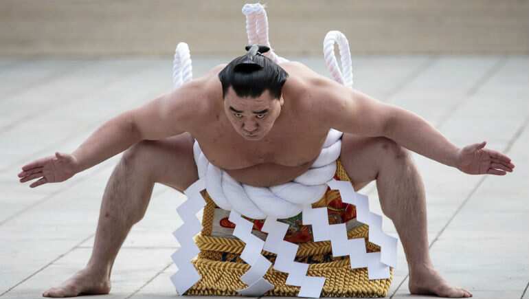 Japanese police question sumo star over alleged beer bottle assault