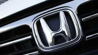 Honda cuts profit, sales outlook to four-year low; unveils $915 million buyback