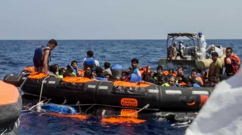At least 25 dead after migrant boat sinks off Libya
