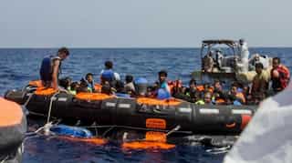 At least 25 dead after migrant boat sinks off Libya