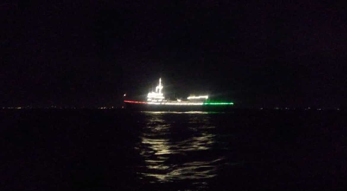 INS Sutlej anchored off port of Colombo, Sri Lanka on the eve of Navy Day