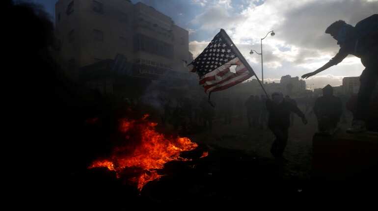 Trump dangles Middle East peace plan to limit Jerusalem outcry