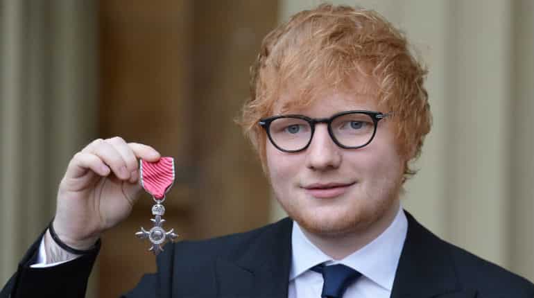 Pop star Ed Sheeran receives honour from Britain's Prince Charles