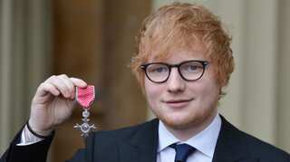 Pop star Ed Sheeran receives honour from Britain's Prince Charles