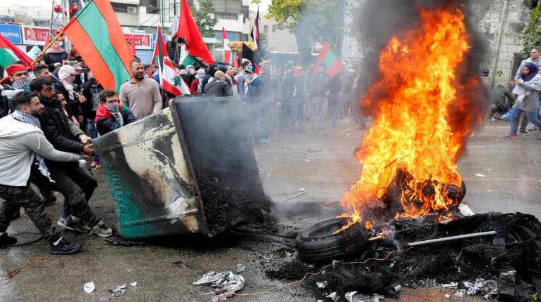 Palestinian stabs Israeli in Jerusalem, anti-Trump protest flares in Beirut