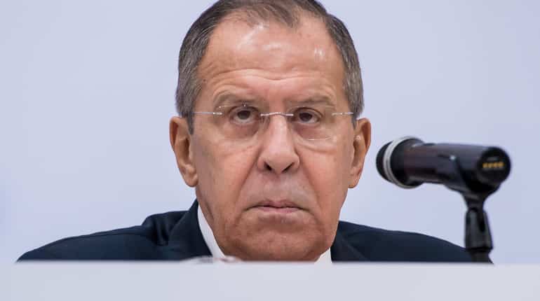 Moscow says will retaliate soon to Britain's expulsion of diplomats