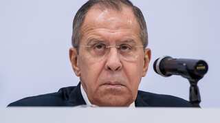 Moscow says will retaliate soon to Britain's expulsion of diplomats