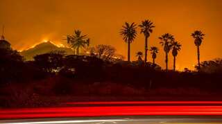 Monster fire slows as California homeowners pick up pieces