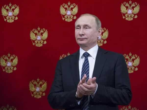 Russia's ruling party backs Putin for presidential polls Russia's ruling party backs Putin for presidential polls