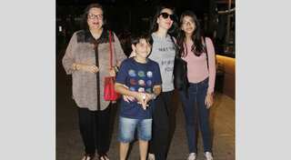 Airport celeb spotting: Karisma Kapoor with kids and mother Babita