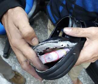 Police arrest two people with Rs 1.72 crore concealed in shoes at Kolkata airport Police arrest two people with Rs 1.72 crore concealed in shoes at Kolkata airport