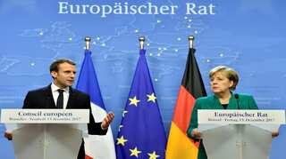 Merkel could join Macron in Davos for epic clash with Trump