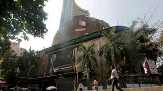 Sensex, Nifty close at record highs