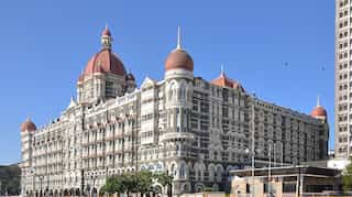 Security beefed up at Taj Hotels in Mumbai after a bomb threat call from Pakistan