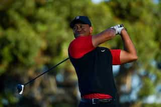 Golf: 'Pleased' Woods seals return with even par 72