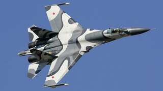 Russia says Su-27 fighter jet intercepted US spy plane; US protests