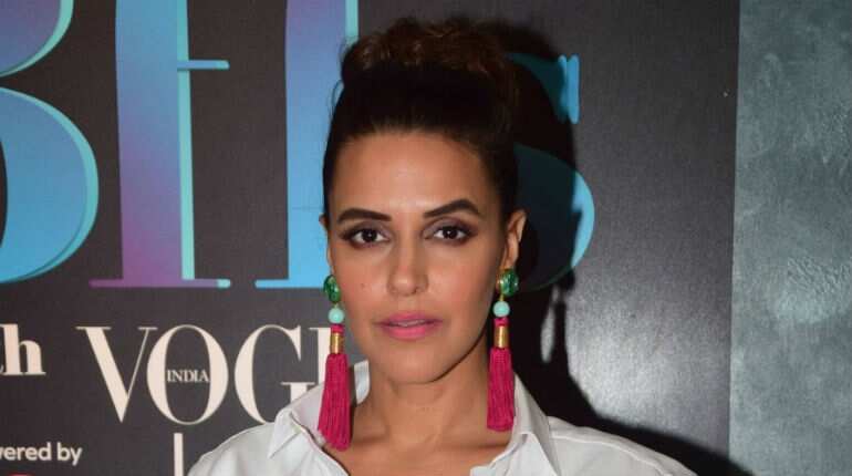 Don't believe in showmanship of a child: Neha Dhupia