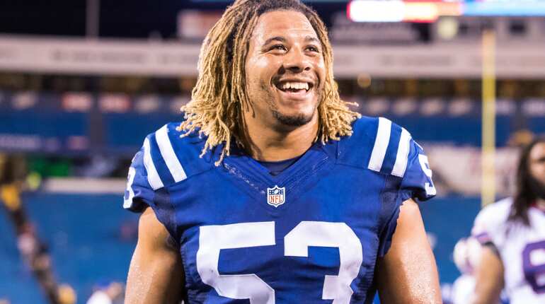 Prosecutor charges suspect in NFL player's death, criticises Trump