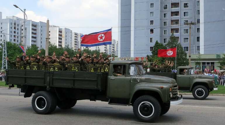 North Korea holds military parade on eve of Olympics