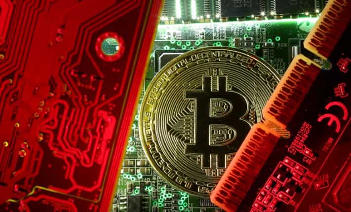 Bitcoin cryptocurrency near record high, hits $19,000 for first time in three years