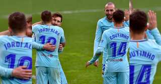 Suarez and Alba help Barcelona to continue unbeaten run