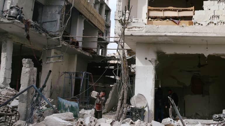 Air strike kills Syrian family of nine in rebel-held Ghouta: Monitor