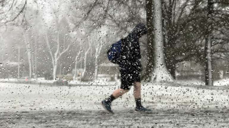 US Northeast still facing flooding, outages after killer storm