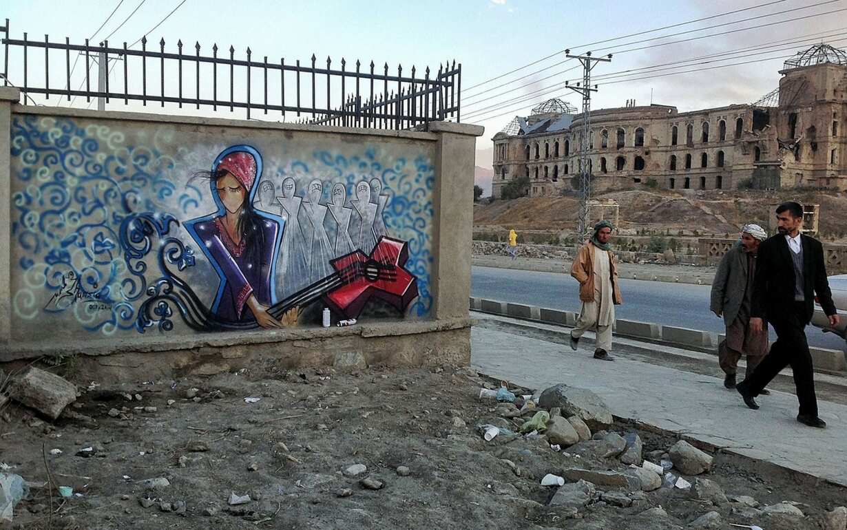 Afghan street artists haunt warlords with graffiti campaign Afghan street artists haunt warlords with graffiti campaign